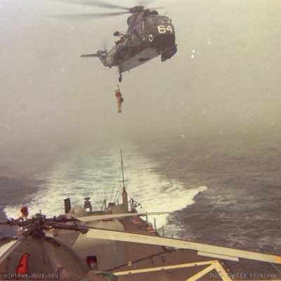 Helo raising man from Jouett, Gulf of Tonkin