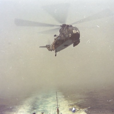 Man Reaching Helo, Gulf of Tonkin