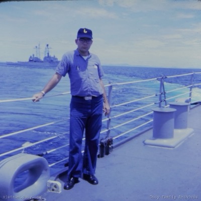 Mike Ducy in front of USS Horne