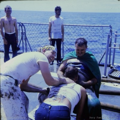 King Neptune Court, Kissing Belly with gun grease