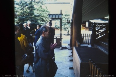Man praying with offering