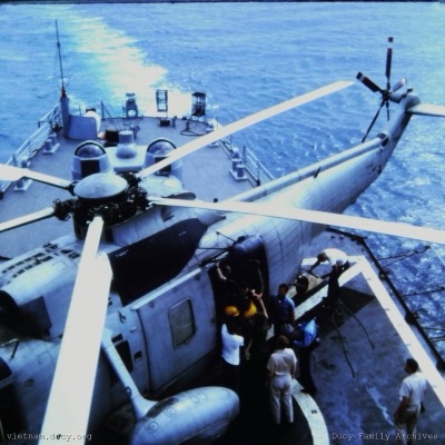 Pilot exiting, yellow life jacket